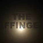 黒い背景に玉で描いたTHE AFFINGERの文字。マウスを近づけたNの下あたりだけが電球色に光っている